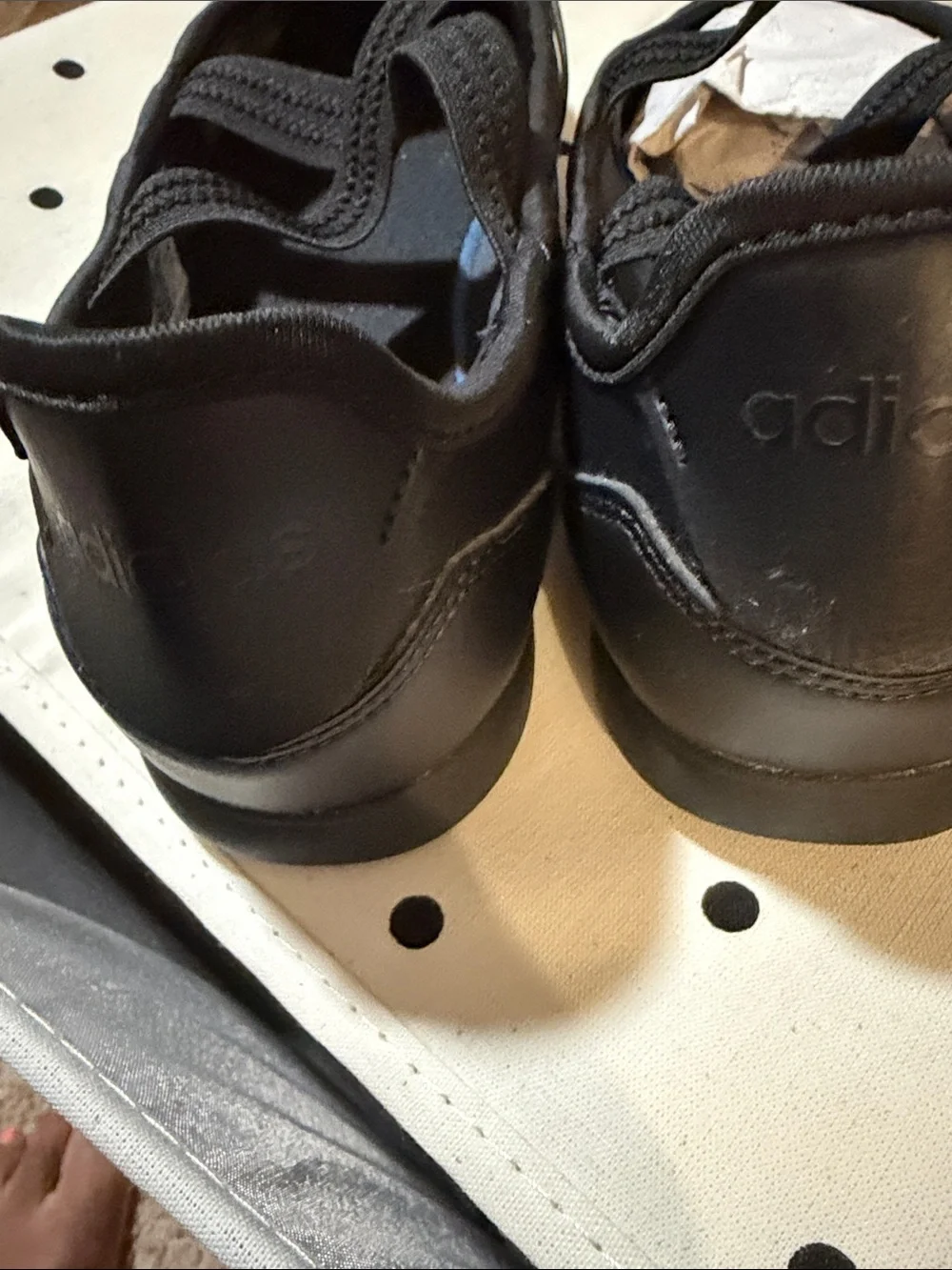 adidas Women's/youth Black Slip-On Athletic Flats with Elastic Cross Straps.